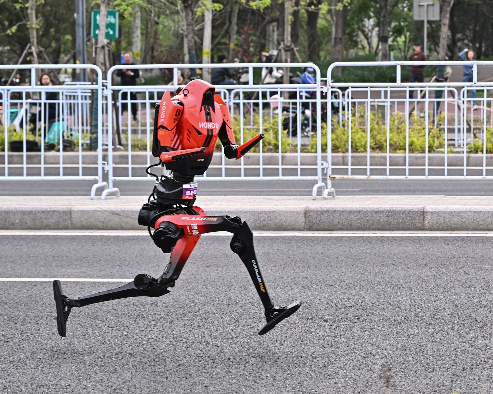 Humanoid robots show rapid advances as they race past humans in Beijing half-marathon
